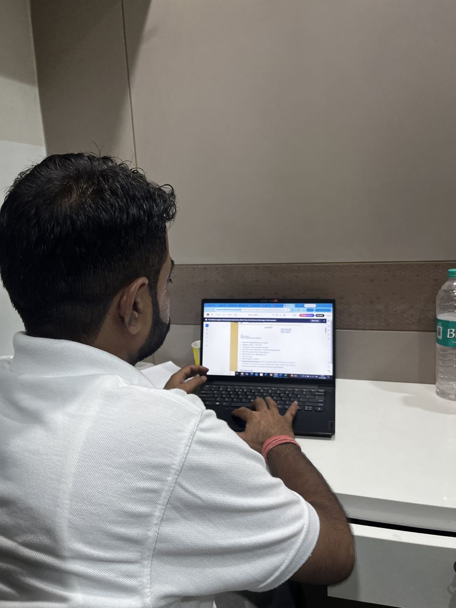 Ritwik Finance team member working on a laptop